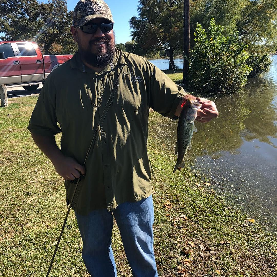 Raul Rodriguez with a bass caught on a Smartbaits Color changing worm from Amazon.com